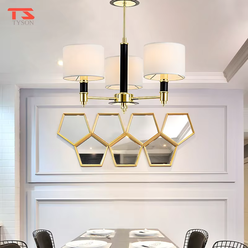 Modern light luxury black-gold contrasting chandelier, with a golden metal frame paired with black decorations and blue transparent glass lampshades, featuring a minimalist and elegant shape, combining decorative and lighting functions, suitable for living rooms, dining rooms, high-end clubs and other modern style spaces.