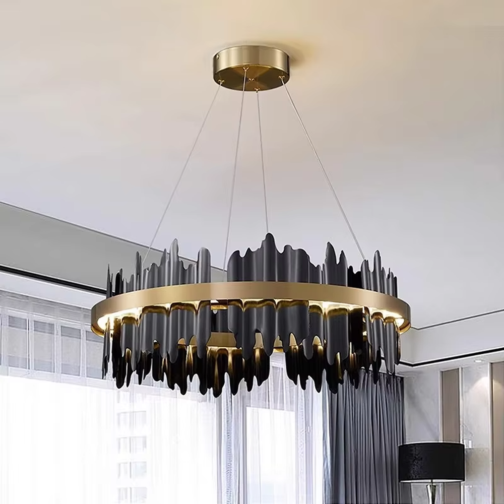 A light luxury and glamorous double-layer ring chandelier, featuring a gold metal frame paired with irregular black hanging glass panels. It emits a brilliant yet soft glow when lit, combining decorative appeal with practical illumination, ideal for creating a high-end and mysterious space atmosphere.