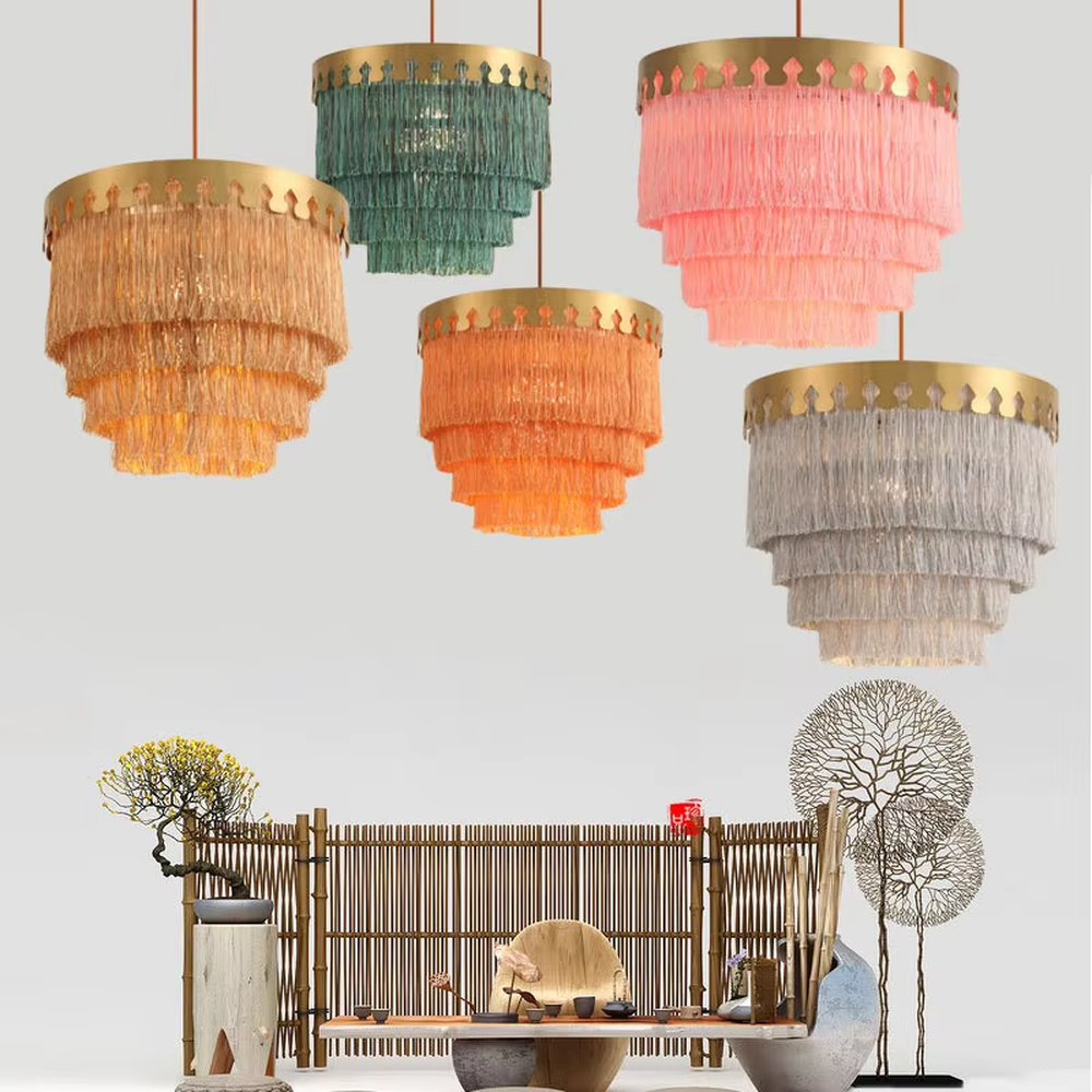 Modern light luxury multi-layer tassel chandelier, with a gold metal top ring paired with three layers of white cascading tassel lampshades, emitting soft and warm light, combining decorativeness and lighting function, suitable for core lighting and atmosphere creation in spaces such as bedrooms, dining rooms, and cloakrooms.