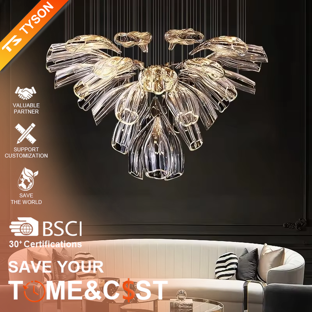 Modern art wing-petal shaped large chandelier, composed of transparent and gold-gradient glass/acrylic leaves in a symmetrical radial hanging structure, emitting transparent and brilliant light, combining artistic decorativeness and lighting function, suitable for core decoration and main lighting in high-ceiling spaces such as villa high-ceiling living rooms, duplex stairwells, and high-end clubs.