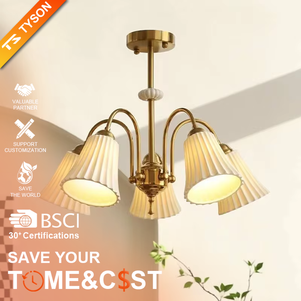 A French retro light luxury style 3-head chandelier, featuring a brass-colored metal frame paired with pleated fabric lampshades. It emits a soft and warm glow when lit, combining decorative appeal with practical illumination, ideal for creating an elegant and romantic space atmosphere.