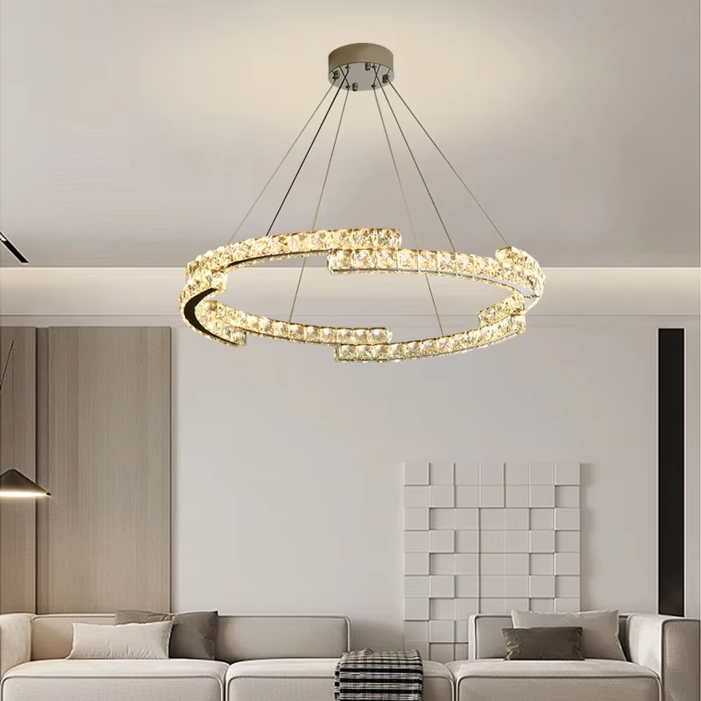 This light luxury irregular multi-layer ring crystal chandelier features a metal frame inlaid with high-transparency crystals, forming staggered ring structures, with brilliant and soft light, serving both lighting and decorative purposes, suitable for modern light luxury spaces such as living rooms and dining rooms.