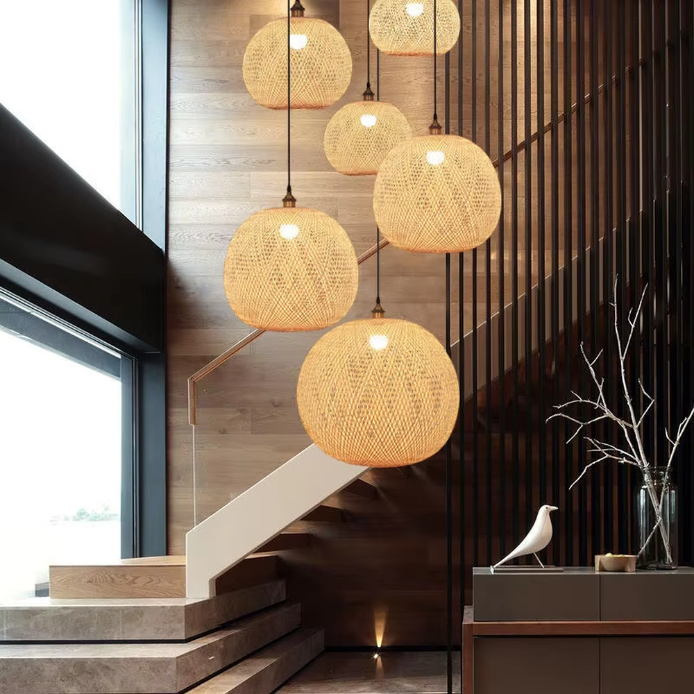 This retro-style bamboo woven cone chandelier is made of natural bamboo strips woven into a hollow cone shape. Warm light refracts through the bamboo texture to emit a soft halo, serving both lighting and decorative purposes, suitable for atmospheric spaces such as retro restaurants and bars.