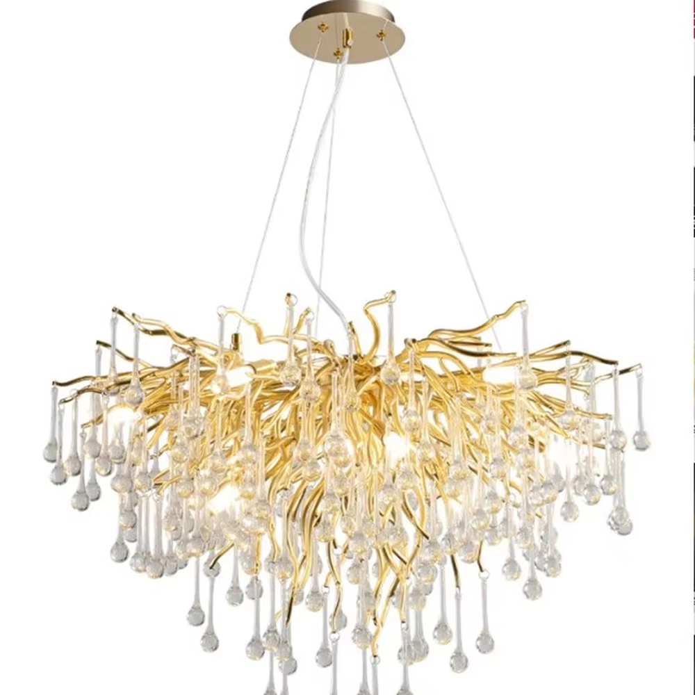 This light luxury golden branch crystal rain linear chandelier features a bionic branch structure made of gold metal, paired with crystal water drop pendants, with brilliant and soft light, serving both lighting and decorative purposes, suitable for modern light luxury spaces such as dining rooms and living rooms.