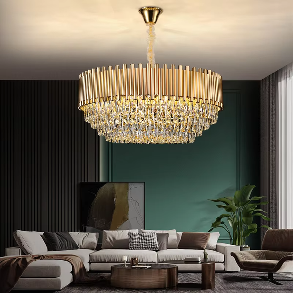 This light luxury double-layer oval chandelier consists of upper gold metal vertical strips and lower faceted crystal pendants. Light refracts through the crystals to emit a brilliant glow, serving both lighting and decorative purposes, suitable for high-end spaces such as villa living rooms and light luxury dining rooms.