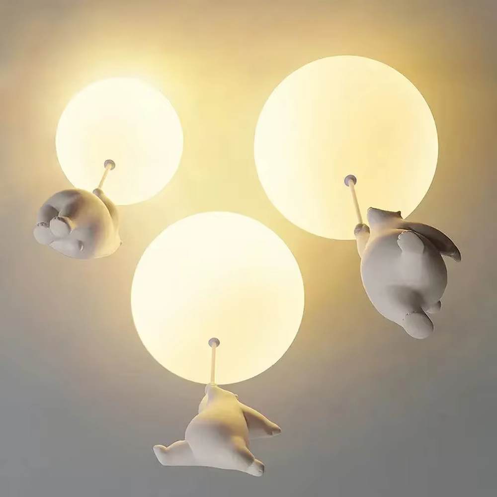 Playful balloon-shaped children's chandelier, with milky white glass ball lampshades and cute little duck pendants, featuring soft and warm light, combining decorative and lighting functions, suitable for children's rooms, parent-child bedrooms and other playful style spaces.