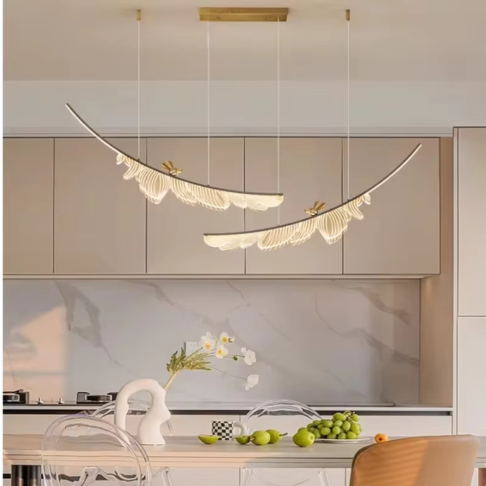 This is a light luxury art-style feather-shaped chandelier, with a black curved metal frame supporting a white light-transmitting feather-shaped lamp body, accented with gold decorations, presenting a dynamic and elegant visual effect, with both decorative and lighting functions, ideal for high-end indoor spaces such as dining rooms and living rooms.