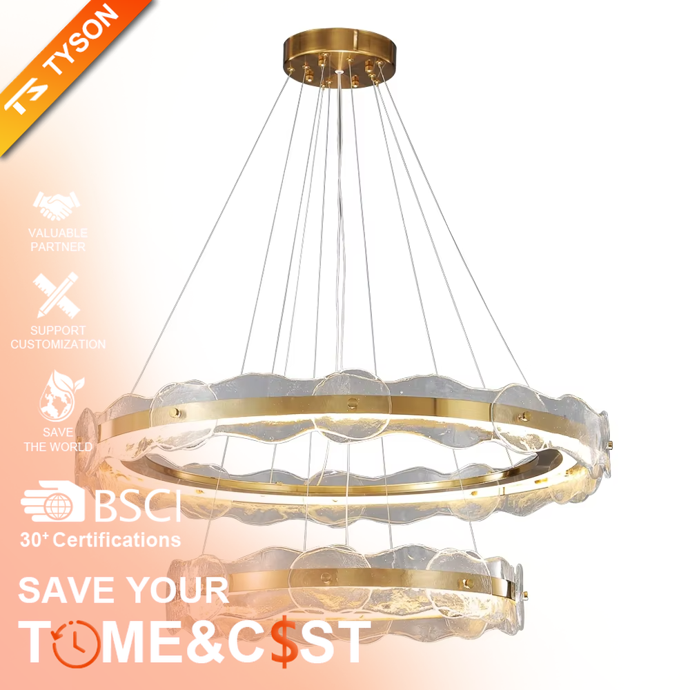 A modern light luxury style double-layer ring chandelier, featuring a gold metal frame paired with transparent glass panels with water ripple texture. It emits a soft and brilliant glow when lit, combining decorative appeal with practical illumination, ideal for creating a high-end and elegant space atmosphere.