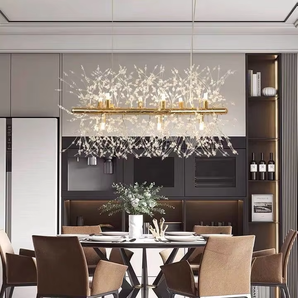Light luxury style dandelion-shaped chandelier, composed of a gold metal frame and a transparent luminous branch and leaf structure, presenting a spherical blooming effect. It emits soft and bright light, combining artistry and lighting function, suitable for atmosphere creation and main lighting in living rooms, dining rooms, bedrooms and other spaces.