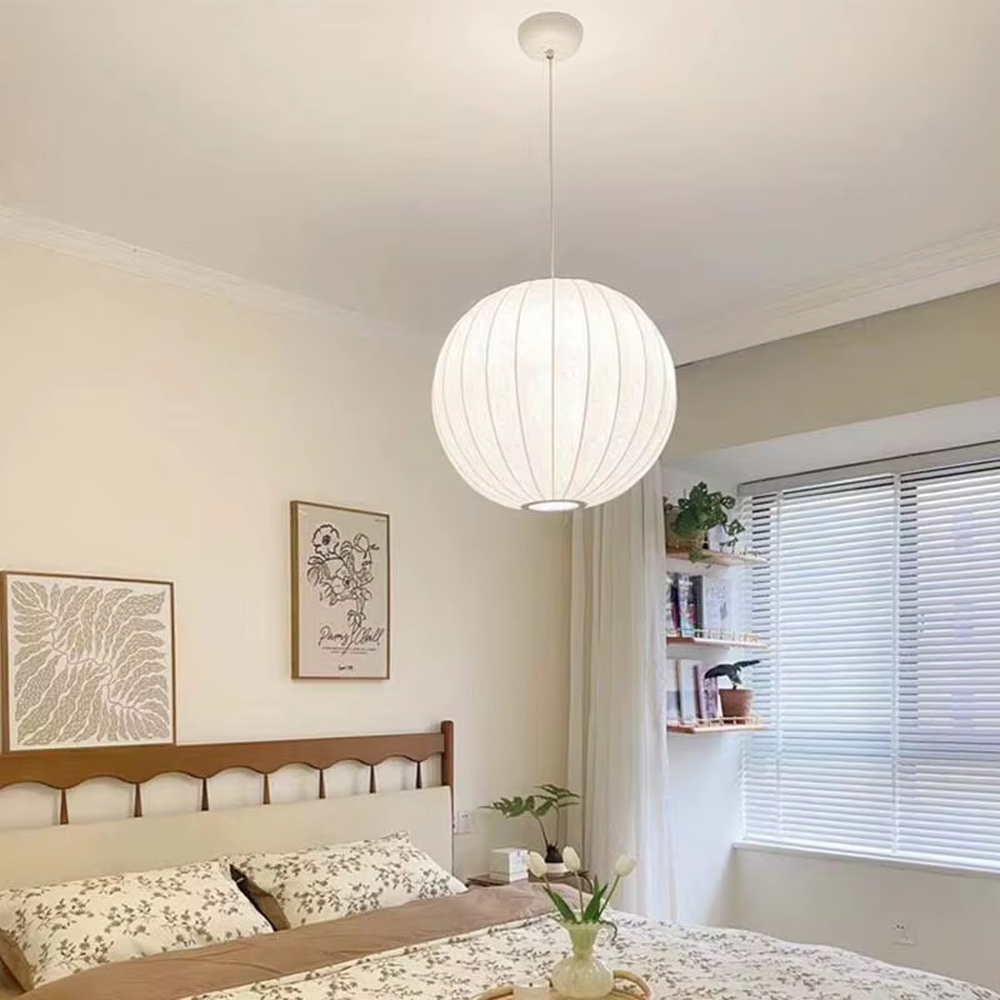 This is a set of modern minimalist multi-shaped pleated fabric chandeliers, composed of off-white pleated lampshades in different shapes such as ellipse, flying saucer and flower bud, which has both soft lighting and artistic decoration functions, suitable for living rooms, dining rooms, B&Bs, cafes and other spaces.