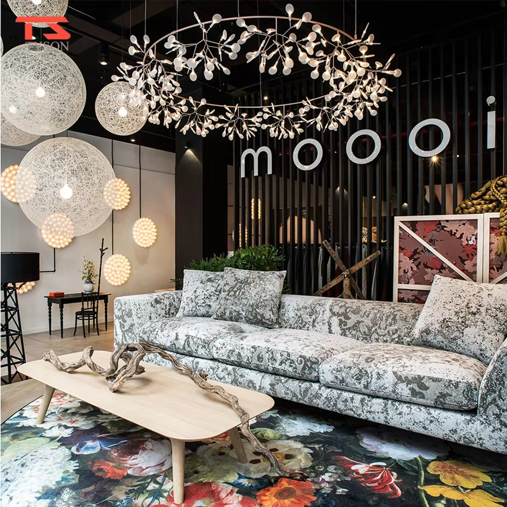 A modern light luxury style firefly branch chandelier, featuring a bionic branch frame made of gold metal, paired with multiple white light-emitting points, shaped like fireflies perched on branches on a summer night. It emits a soft and dynamic glow when lit, combining decorative appeal with practical illumination, ideal for creating a romantic and healing space atmosphere.