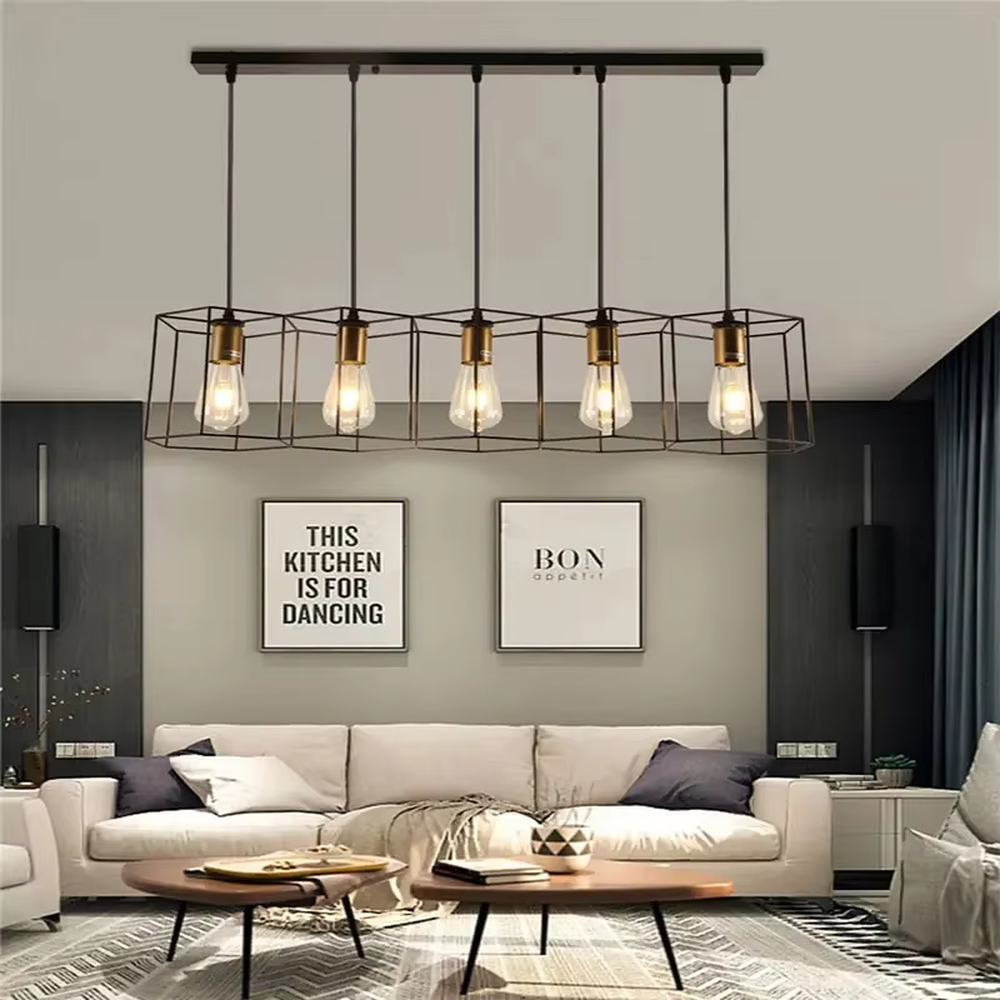 An industrial style 5-head linear chandelier, featuring geometric cage lampshades made of dark brown metal paired with vintage filament bulbs. Its linear arrangement combines decorative appeal with practical illumination, ideal for creating a bold and rugged space atmosphere.
