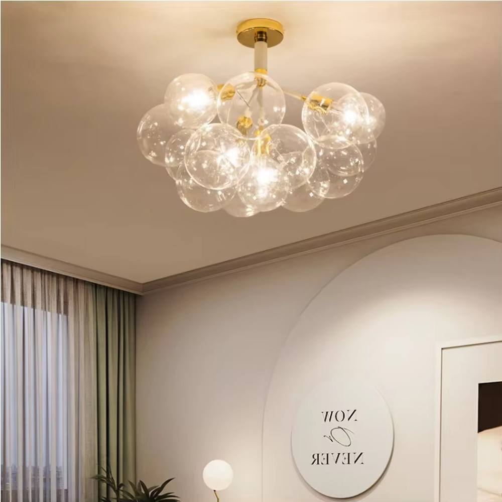 Modern light luxury bubble glass semi-flush mount ceiling light, with a golden base paired with transparent glass ball lampshades stacked into a cloud shape, featuring transparent and soft light, combining decorative and lighting functions, suitable for living rooms, bedrooms and other modern style spaces.