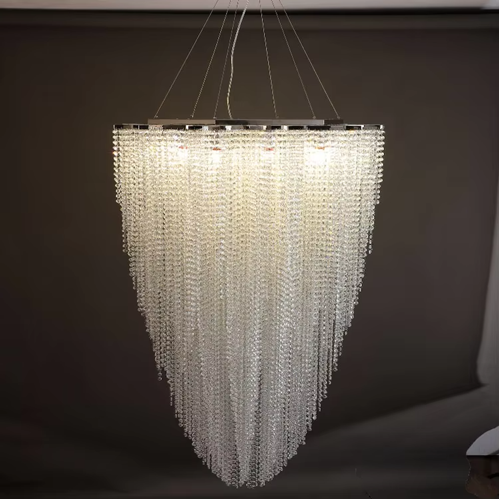 Romantic heart-shaped layered crystal chandelier, crafted with high-density crystal particles to create a full heart shape, paired with a metal top base and adjustable suspension rods, featuring soft and brilliant light, combining decorative and lighting functions, suitable for wedding rooms, bedrooms, high-end restaurants, romantic theme clubs and other spaces.