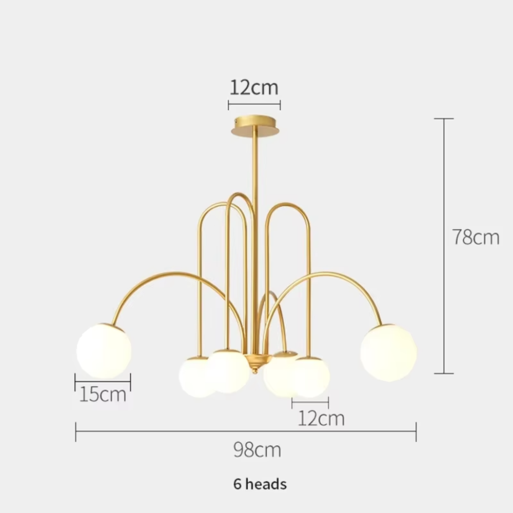 A multi-head chandelier combining modern light luxury and French retro styles, featuring a gold metal curved branch frame paired with milky white glass glowing spheres of varying sizes. It emits soft and uniform warm light when lit, combining decorative appeal with practical illumination, ideal for creating an elegant and dynamic space atmosphere.