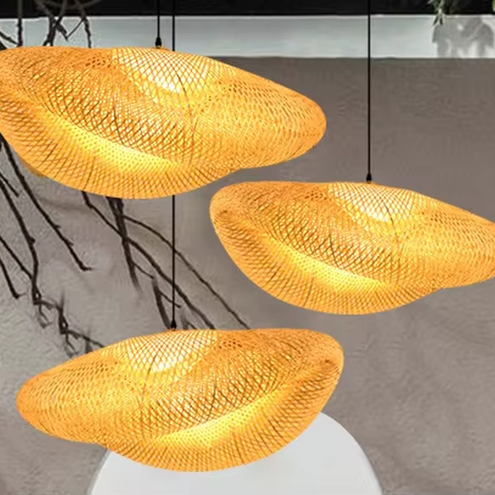 This wabi-sabi style hand-woven rattan cloud chandelier is made of natural rattan woven into an irregular UFO shape. Warm light passes through the woven texture to emit a soft and transparent halo, combining natural texture and artistic atmosphere, suitable for lighting and decoration in natural style spaces such as restaurants and tea rooms.