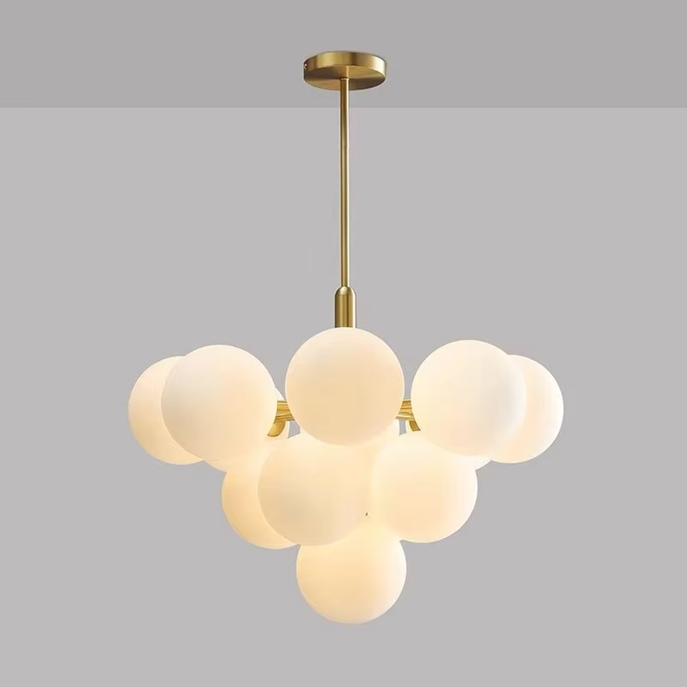 Modern light luxury cloud-shaped chandelier, with a golden metal frame and milky white frosted glass ball lampshades stacked into a full cloud shape, featuring soft and warm light, combining decorative and lighting functions, suitable for living rooms, dining rooms, bedrooms and other modern style spaces.