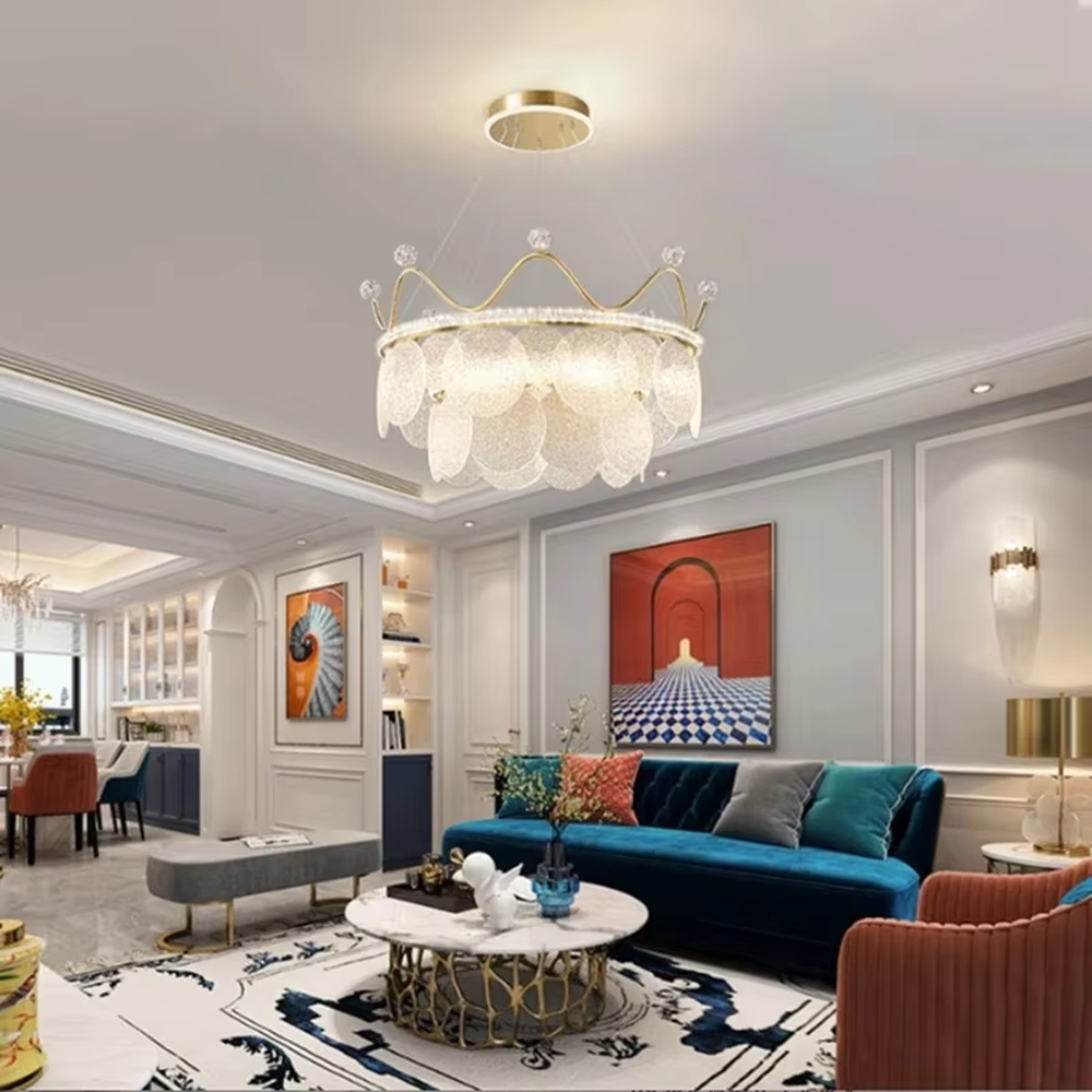 A light luxury princess-style crown-shaped chandelier, featuring a gold metal crown frame paired with crystal decorations and glowing glass lampshades. It emits a brilliant yet soft glow when lit, combining decorative appeal with practical illumination, ideal for creating a romantic and dreamy space atmosphere.