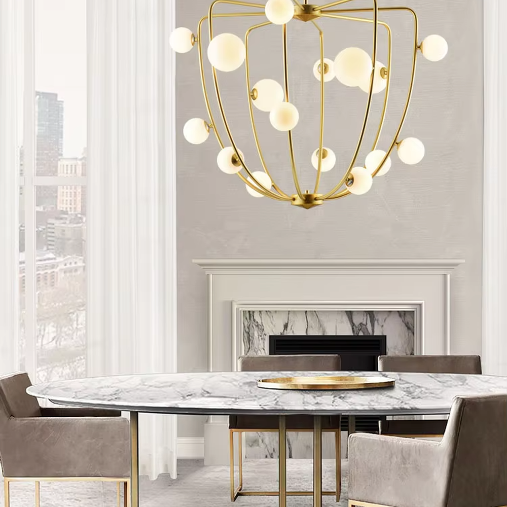 This light luxury rhombus cluster chandelier features a rhombus polyhedron frame made of gold metal, paired with white spherical lampshades, with soft and dreamy light, serving both lighting and decorative purposes, suitable for modern light luxury spaces such as living rooms and dining rooms.