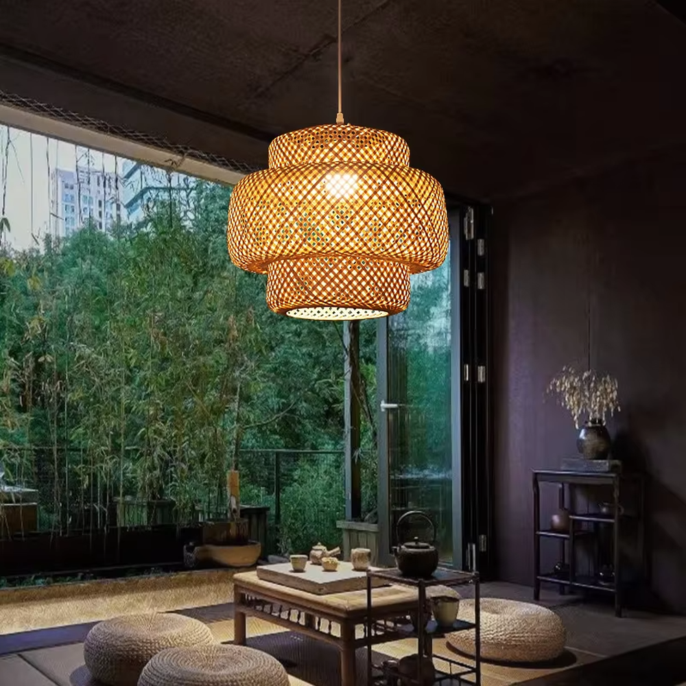 This new Chinese-style multi-layer bamboo woven lantern chandelier is made of natural bamboo strips woven into a hollow layered shape. Warm light refracts a soft halo through the bamboo texture, serving both lighting and decorative purposes, suitable for natural-style spaces such as tea rooms and restaurants.