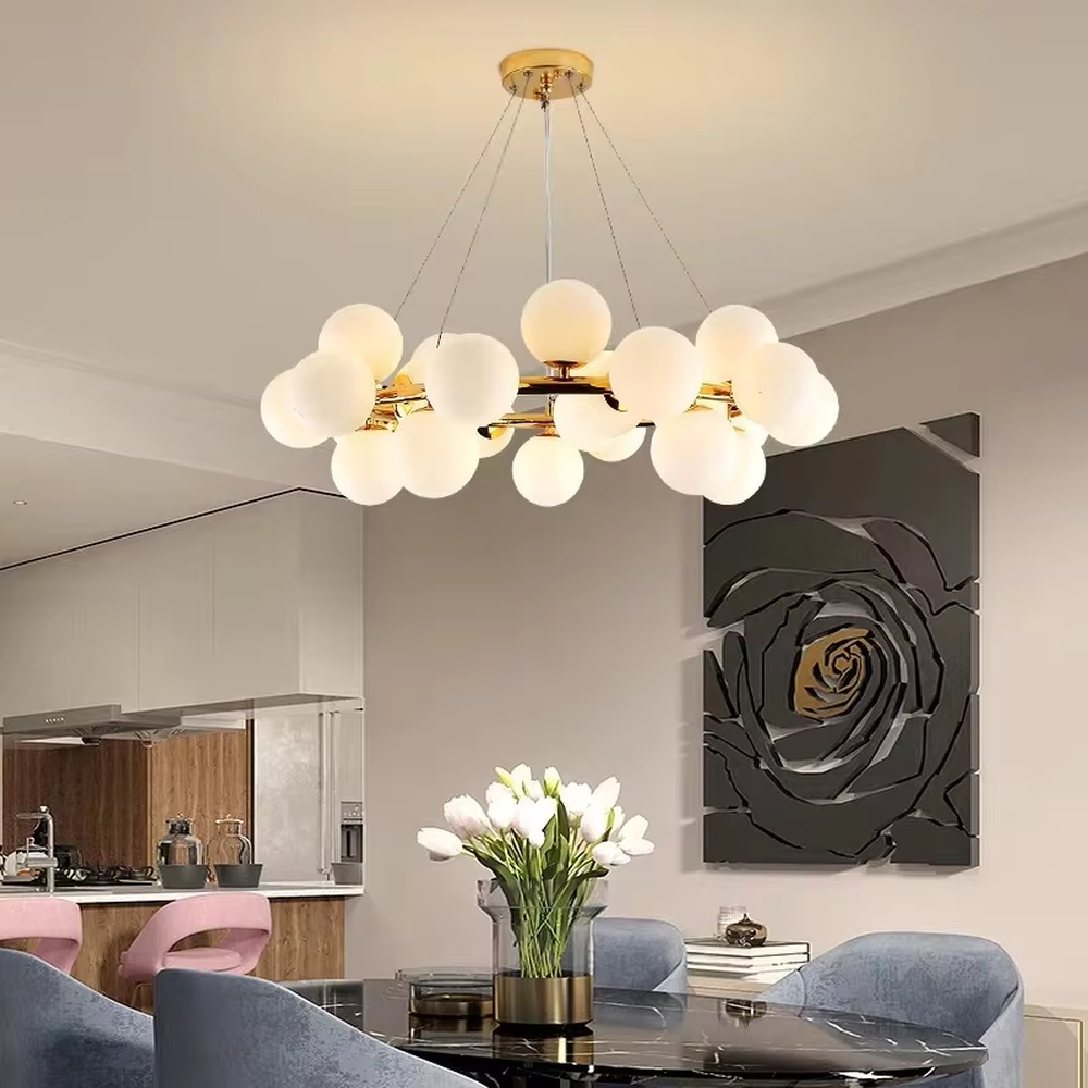 Modern minimalist cloud-shaped chandelier, with a golden metal frame and milky white glass ball lampshades, featuring soft and uniform light, combining decorative and lighting functions, suitable for living rooms, dining rooms, bedrooms and other modern style spaces.