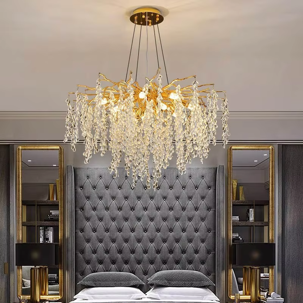 This is a light luxury art-style branch-shaped crystal chandelier, with a gold metal branch frame paired with densely hanging crystal pendants, presenting a dynamic flower cluster blooming effect, with both decorative and lighting functions, ideal for high-end indoor spaces such as living rooms and dining rooms.