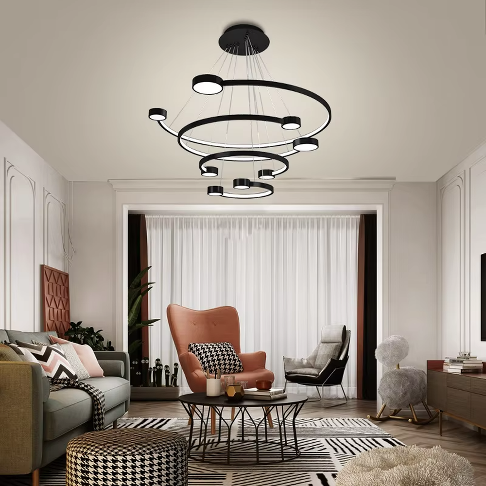 A modern light luxury multi-layer ring floating chandelier, featuring a golden metal ring structure paired with LED light strips and a bottom circular luminous panel. It has an adjustable suspension rod design, combining lighting and decorative functions, ideal for creating an elegant and high-end space atmosphere.