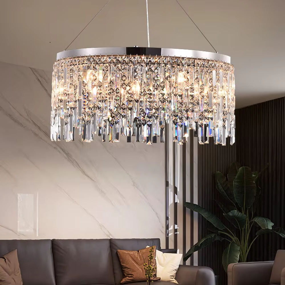 This light luxury tassel crystal chandelier features a circular tassel shape made of a metal frame and multi-layer faceted crystal strips, with light refracting a brilliant halo through the crystals, serving both lighting and decorative purposes, suitable for modern light luxury spaces such as living rooms and dining rooms.
