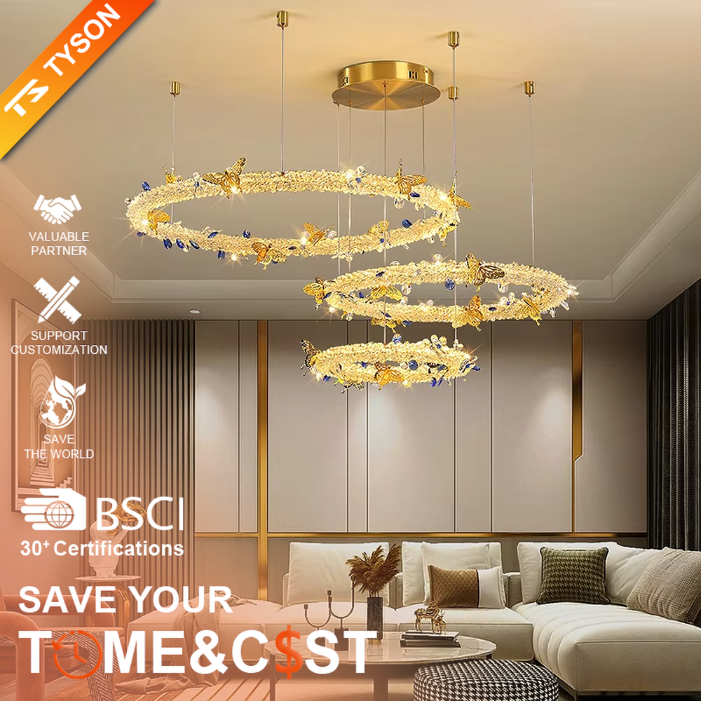 A light luxury and glamorous three-tiered ring chandelier, decorated with crystal gravel, natural blue-veined stone, and gold metal butterflies. Its staggered ring structure resembles flowing cosmic orbits, emitting a brilliant yet soft glow when lit, combining artistic decoration with lighting functionality, ideal for creating a high-end and romantic space atmosphere.