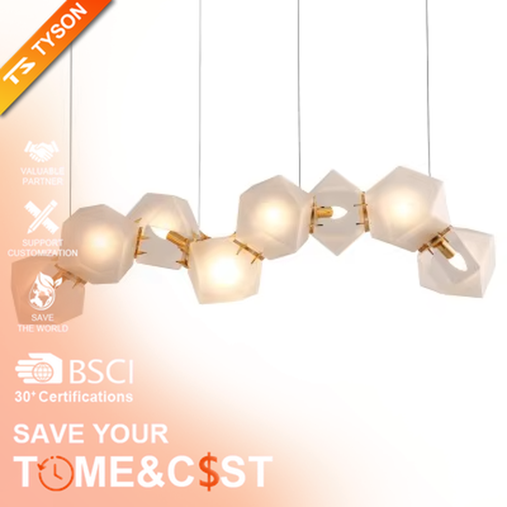 A modern light luxury style wave-shaped linear chandelier, suspended by gold wires, paired with frosted geometric polyhedral lampshades. It emits a soft and warm glow when lit, combining decorative appeal with practical illumination, ideal for creating an exquisite and high-end space atmosphere.