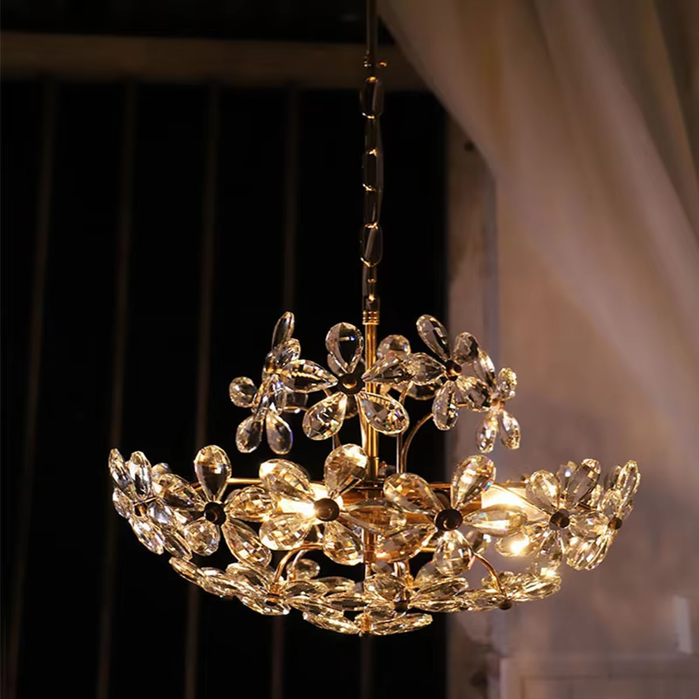 A French light luxury style double-layer crystal petal chandelier, featuring a gold iron frame inlaid with K9 crystal petal decorations. It emits a brilliant and soft glow when lit, combining decorative appeal with practical illumination, ideal for creating a romantic and retro space atmosphere.