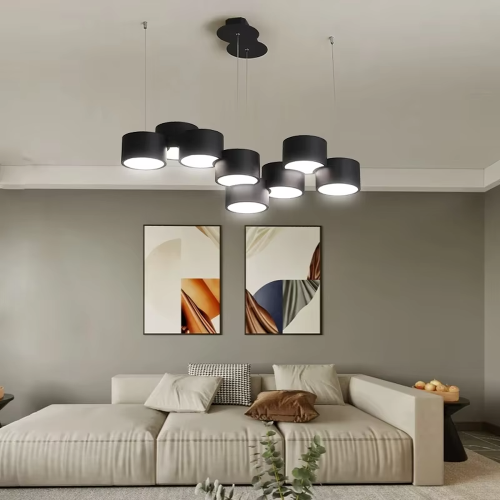 A modern minimalist multi-head cylindrical chandelier, featuring a white metal housing with a staggered stacked layout, built-in LED light source. It emits soft and uniform warm light when lit, combining decorative appeal with practical illumination, ideal for creating a minimalist and fresh space atmosphere.