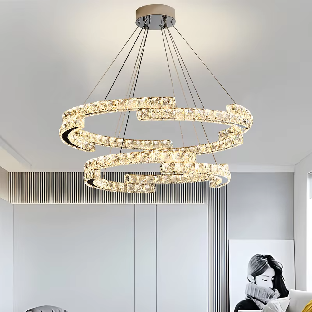This is a luxurious large chandelier, supported by a gold metal frame with multi-layer crystal pendants, featuring a blooming and gorgeous shape, with brilliant and dazzling light, both decorative and lighting functions, ideal for large commercial spaces such as high-end restaurants and hotel lobbies.