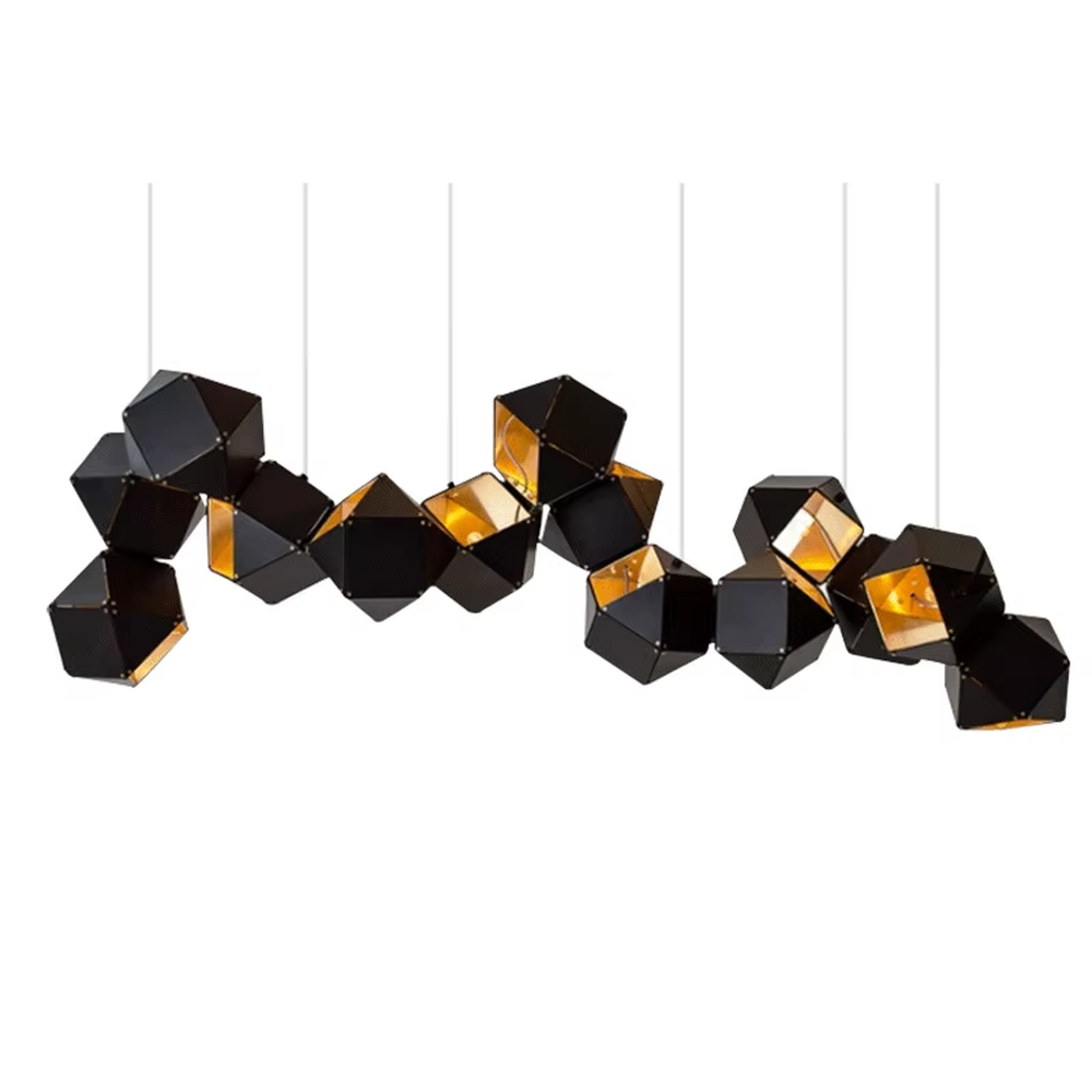 A modern industrial light luxury style geometric splicing chandelier, featuring a black metal polyhedron frame paired with amber glass facets and gold rivet decorations. When lit, the light refracts to create a brilliant effect, combining decorative appeal with practical illumination, ideal for creating a bold and avant-garde space atmosphere.