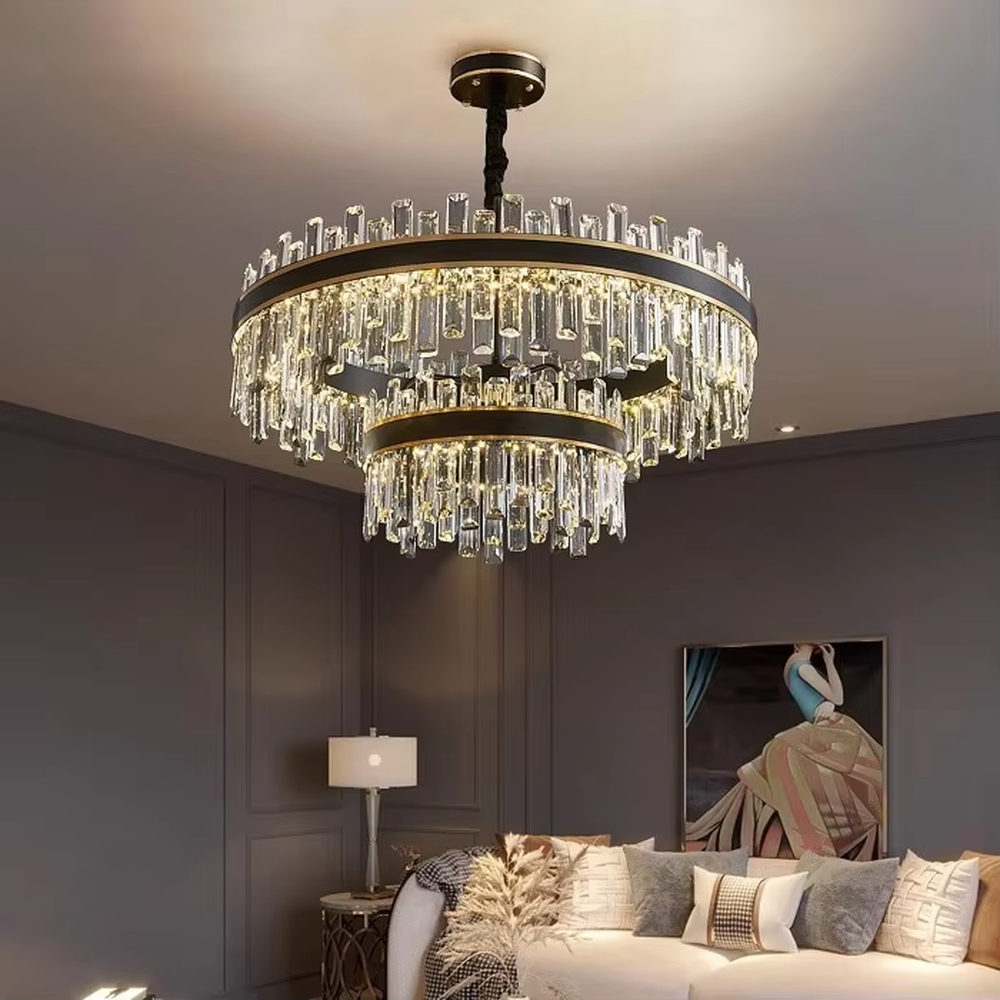 Modern light luxury double-layer ring crystal chandelier, with a golden metal frame and layered transparent crystal strips hanging down, featuring bright and soft light, combining decorative and lighting functions, suitable for living rooms, dining rooms, villas and other light luxury style spaces.
