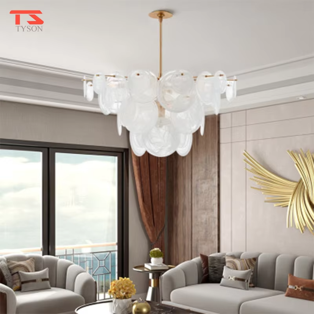 Modern light luxury gradient glass sheet chandelier, with a golden metal frame paired with transparent and gradient gray round glass sheets, stacked into a transparent and gorgeous bubble shape, combining decorative and lighting functions, suitable for dining rooms, living rooms, high-end clubs and other light luxury style spaces.