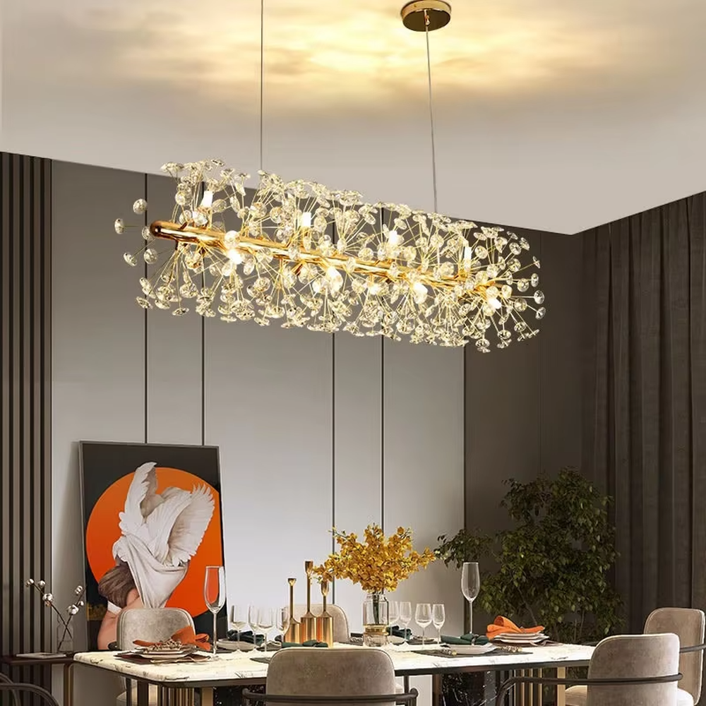 Modern light luxury starry sky oval crystal chandelier, featuring a gold metal frame covered with transparent crystal ornaments. Light refracts through the crystals to create a brilliant glow, combining luxury texture and artistic ambiance, making it a high-end decorative lighting fixture that elevates the space's style.