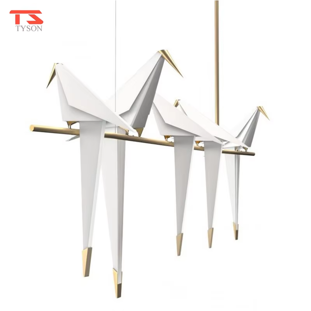 A modern art style linear chandelier in the shape of origami cranes, featuring a gold metal frame paired with translucent paper origami crane lampshades. It emits a soft and warm glow when lit, combining artistic decoration with lighting functionality, ideal for creating a soothing and romantic space atmosphere.
