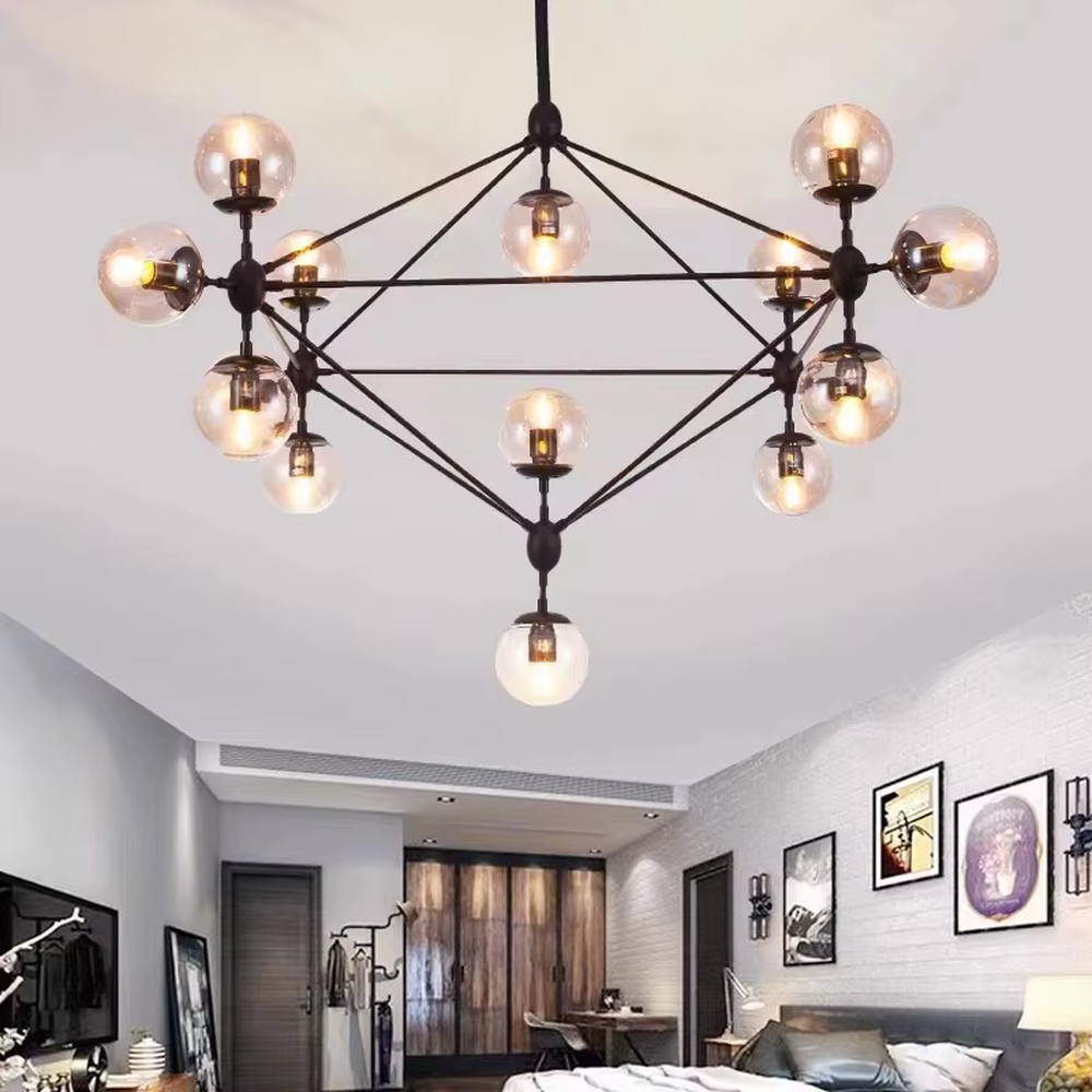 An industrial and modern minimalist combined molecular structure chandelier, featuring a cubic geometric frame made of black iron, paired with amber glass ball bulbs. It emits a warm and soft glow when lit, combining decorative appeal with practical illumination, ideal for creating a bold and avant-garde space atmosphere.