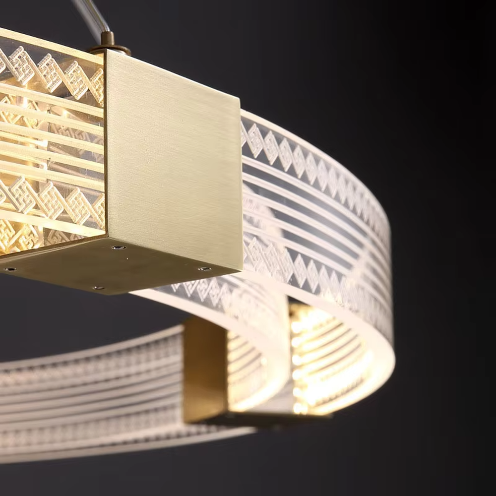 A modern light luxury style double-layer ring chandelier, decorated with gold metal squares and paired with diamond-textured transparent rings. The built-in LED strip emits a soft and brilliant glow when lit, combining decorative appeal with practical illumination, ideal for creating a high-end minimalist space atmosphere.
