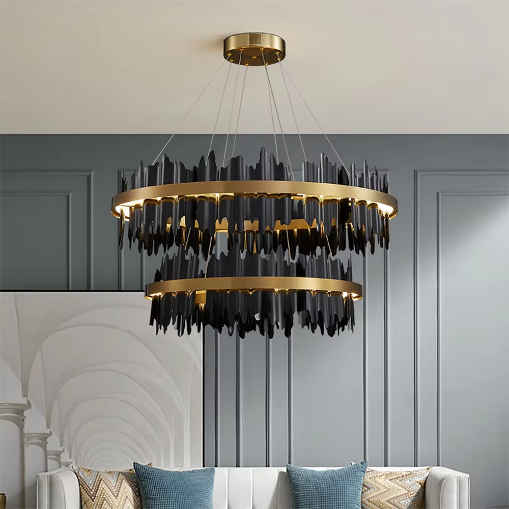 A light luxury and glamorous double-layer ring chandelier, featuring a gold metal frame paired with irregular black hanging glass panels. It emits a brilliant yet soft glow when lit, combining decorative appeal with practical illumination, ideal for creating a high-end and mysterious space atmosphere.