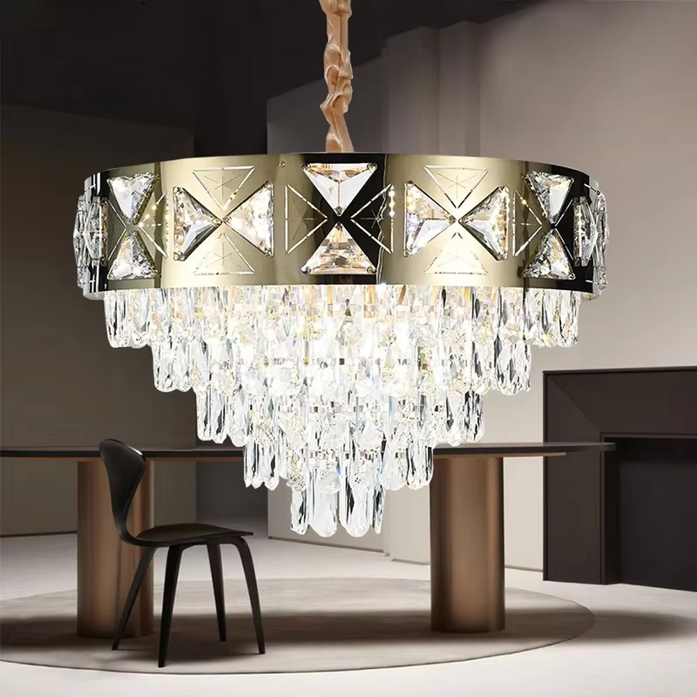 This is a luxurious round crystal chandelier, with a gold metal frame inlaid with cut crystal decorations, and cascading crystal strips hanging below, featuring brilliant and soft light, both decorative and lighting functions, ideal for high-end indoor spaces such as living rooms and dining rooms.