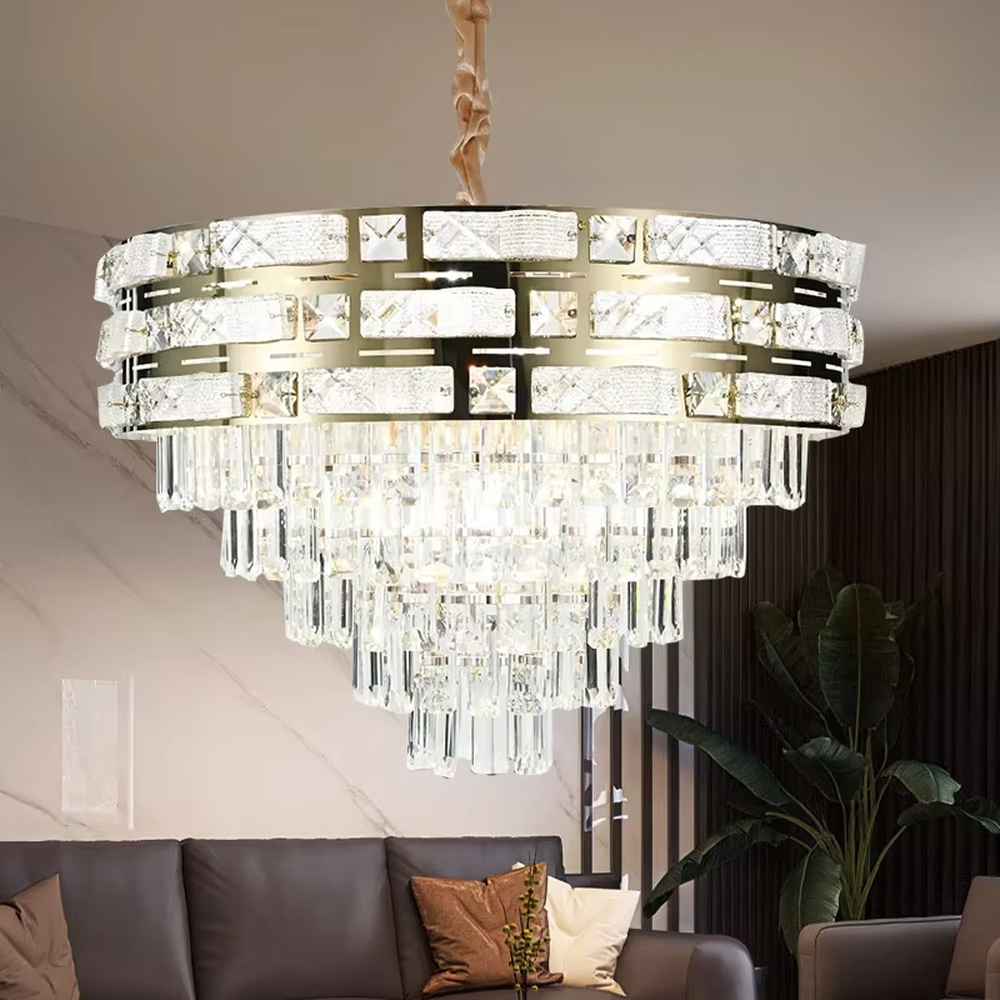 This is a luxurious multi-layer round crystal chandelier, with a gold metal frame inlaid with cut crystal decorations and cascading crystal strips hanging below, featuring brilliant and soft light, both decorative and lighting functions, ideal for high-end indoor spaces such as living rooms and dining rooms.