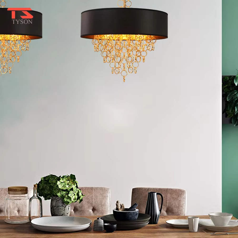 Modern light luxury black-gold ring tassel chandelier, with a black fabric lampshade paired with golden metal ring tassel design, featuring luxurious and soft light, combining decorative and lighting functions, suitable for living rooms, dining rooms, hotels and clubs in light luxury style.
