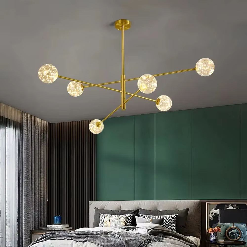 Modern light luxury starry sky molecular ball chandelier, with golden metal branch frame paired with starry sky effect glass ball lampshades, shaped like interstellar molecular clusters, featuring brilliant and soft light, combining decorative and lighting functions, suitable for living rooms, dining rooms, light luxury style spaces.