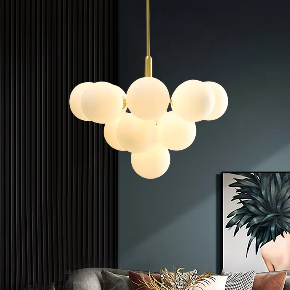 Modern light luxury cloud-shaped chandelier, with a golden metal frame and milky white frosted glass ball lampshades stacked into a full cloud shape, featuring soft and warm light, combining decorative and lighting functions, suitable for living rooms, dining rooms, bedrooms and other modern style spaces.