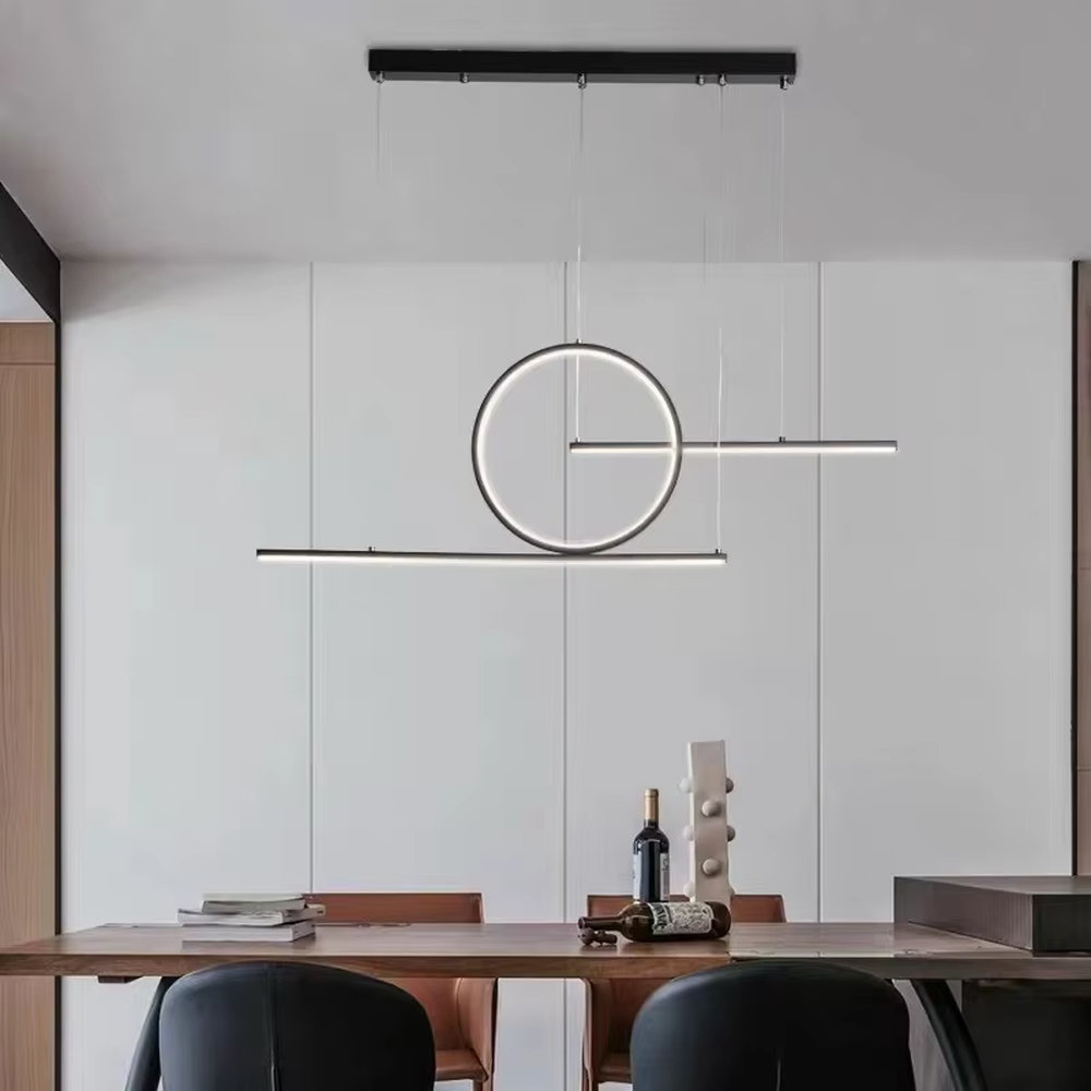 A modern minimalist and new Chinese style geometric linear chandelier, featuring a gold metal frame composed of a circle and two straight lines, with built-in LED strips. It emits a soft and uniform glow when lit, combining decorative appeal with practical illumination, ideal for creating a minimalist and Zen space atmosphere.