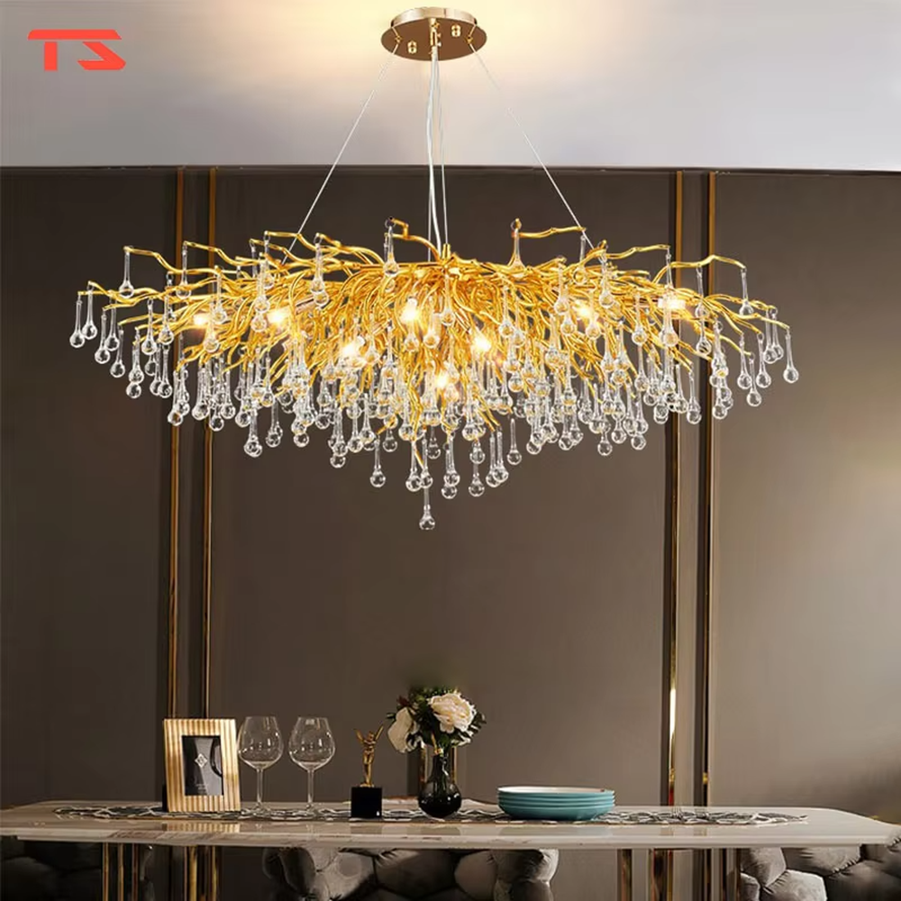 This light luxury golden branch crystal rain linear chandelier features a bionic branch structure made of gold metal, paired with crystal water drop pendants, with brilliant and soft light, serving both lighting and decorative purposes, suitable for modern light luxury spaces such as dining rooms and living rooms.