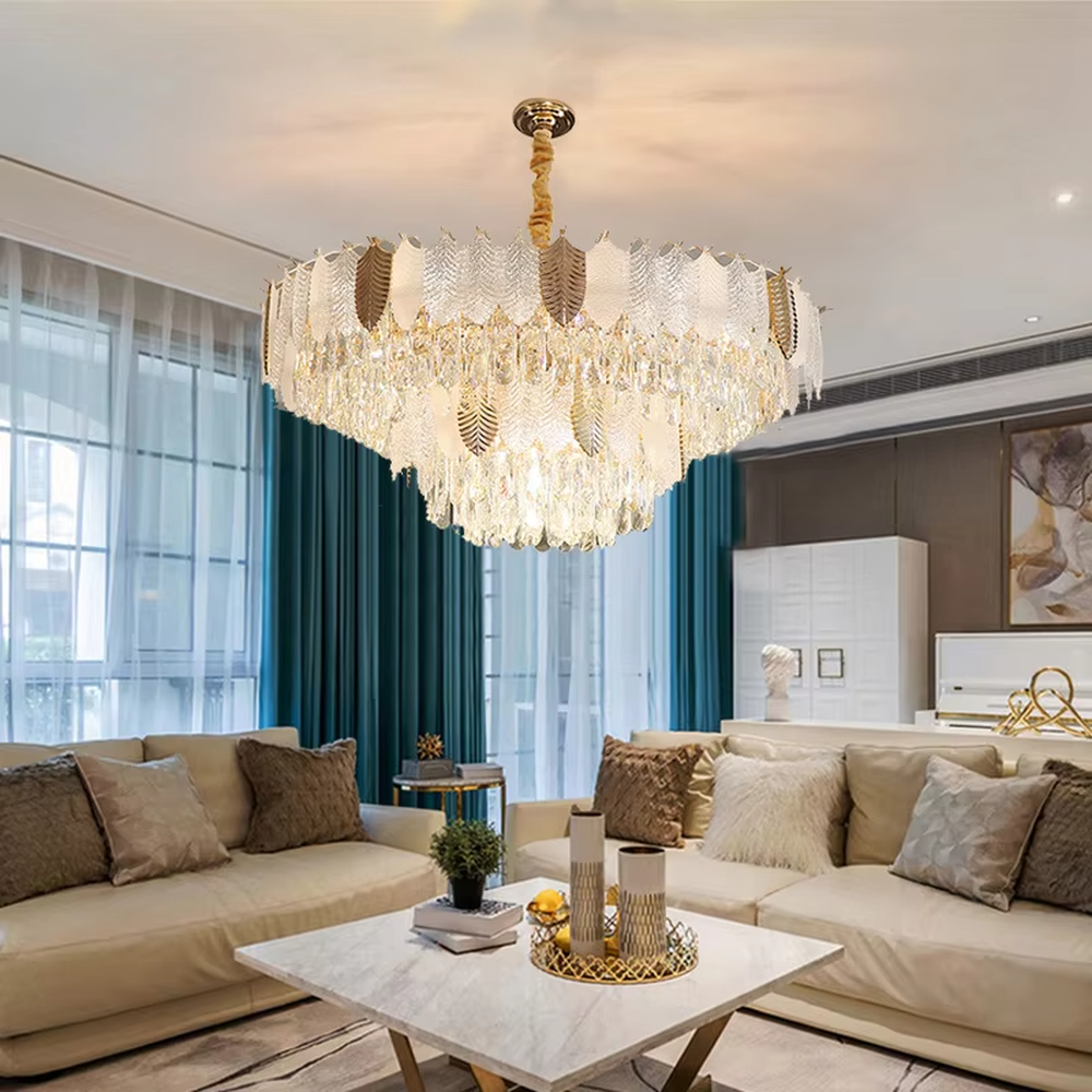 This light luxury leaf crystal chandelier features a gold metal frame paired with leaf-shaped liuli ornaments and drooping crystal tassels, with light refracting a brilliant halo through the crystals, serving both lighting and decorative purposes, suitable for modern light luxury spaces such as living rooms and dining rooms.