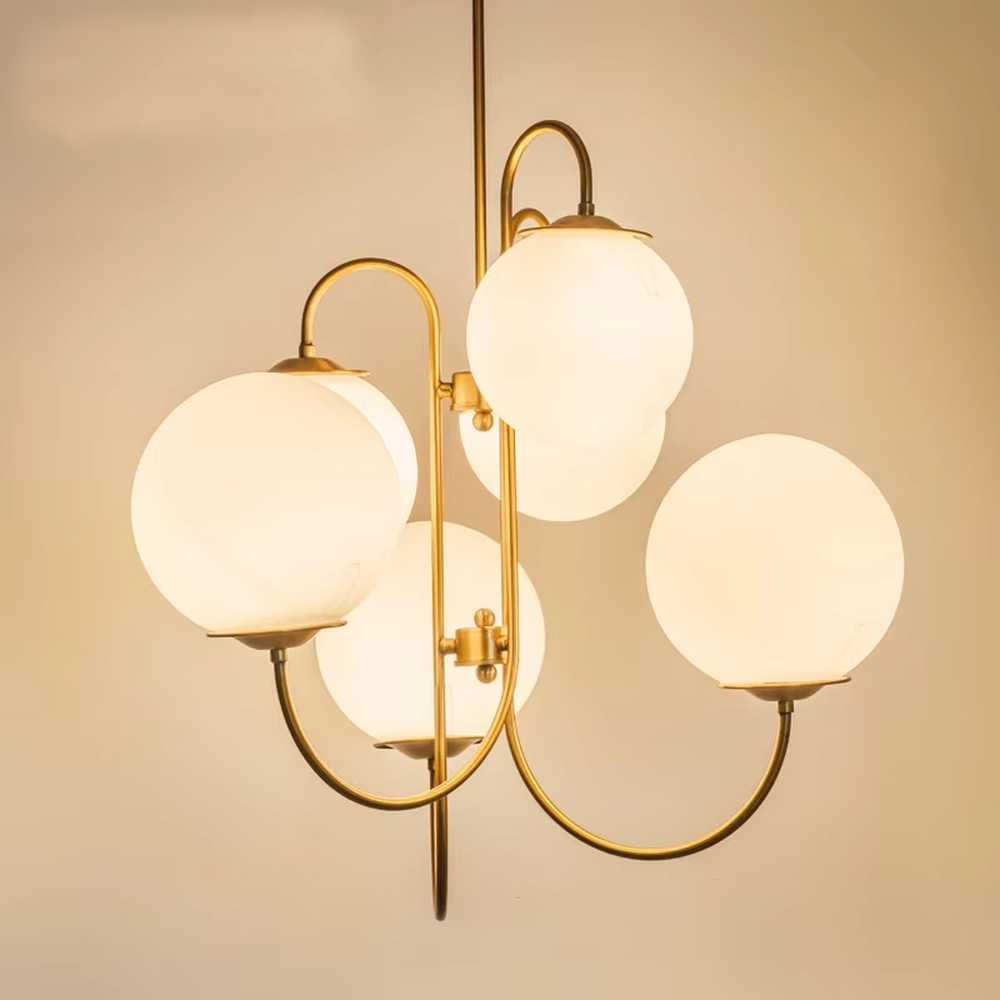 This light luxury golden cloud bubble chandelier features a gold curved metal frame paired with multiple white spherical frosted lampshades, with soft and uniform light, serving both lighting and decorative purposes, suitable for modern light luxury spaces such as living rooms and dining rooms.